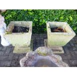 A PAIR OF COMPOSITE SQUARE PLANTERS, on separate bases