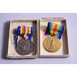 A GROUP OF TWO WWI MEDALS, with original boxes of issue, correctly named - British War and Victory