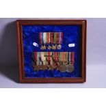 A WOODEN FRAME - UNGLAZED CONTAINING A GROUP OF WWII MEDALS, namely 1939-45, Atlantic, Africa (North