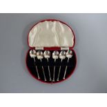 A CASED SET OF SILVER ARTS AND CRAFTS COFFEE SPOONS, Sheffield 1930-1, weight approximately 1.