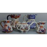 FOUR OCTAGONAL MASONS PATENT IRONSTONE JUGS, all with serpent handles, approximately 17.5cm ,19.