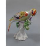 A DERBY WOODPECKER, William Duesbury & Co, c.1760, decorated in polychrome enamels on tree stump