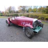 A RED BENTLEY 4 1/4 LITRE SALOON CAR, an MK6 model converted to a sports four seater, the Bentley