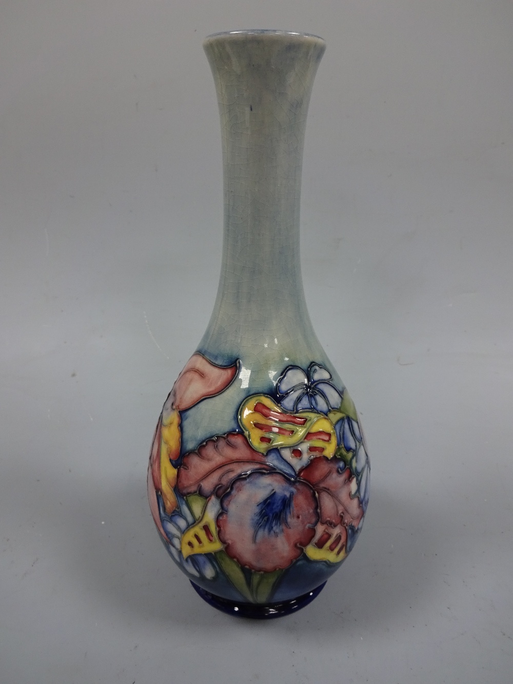 A MOORCROFT FOOTED BOTTLE VASE, with flared neck, tube line decorated with frilled orchid pattern to - Image 2 of 4