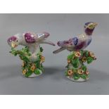 TWO DERBY FIGURINES, William Duesbury & Co, c.1765, modelled as finches, both with purple accents