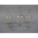 THREE MARY GREGORY STYLE CLEAR GLASS GLOBULAR DECANTERS, decorated with children offering flowers in