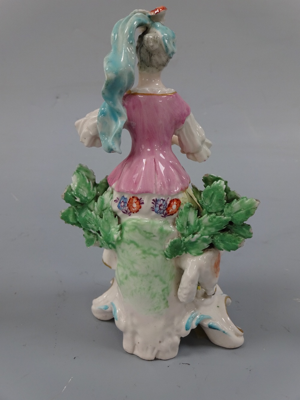 AN 18TH CENTURY DERBY FIGURINE, c.1765-70, musical shepherdess, modelled as shepherdess sat on - Image 2 of 2