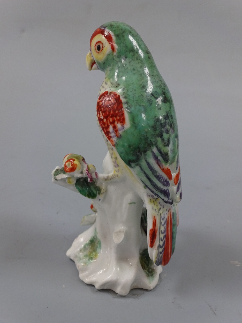 A DERBY PARAKEET FIGURE, c.1765, on floral encrusted branch, approximately 9.5cm high (a/f) (D. - Image 2 of 4