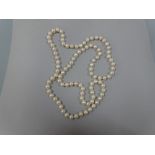 A PEARL NECKLACE, comprising of cultured pearls, all of similar size, measuring 6.3mm, approximate