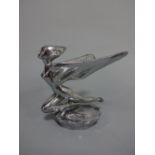 A CHROMED KNEELING 'SPIRIT OF ECSTASY' CAR MASCOT, on shaped plinth, impressed E124 under,