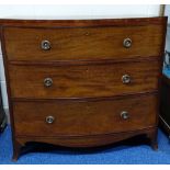 A 19TH CENTURY MAHOGANY BOW FRONT CHEST OF THREE GRADUATED LONG DRAWERS, on shaped splayed feet,