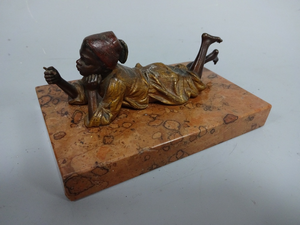 A COLD PAINTED BERGMANN FIGURE, modelled as young Arab boy lying on front smoking, impressed - Image 2 of 4