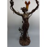 A THREE BRANCH FIGURAL LAMP, modelled as scantily clad Art Nouveau maiden with naturalistic