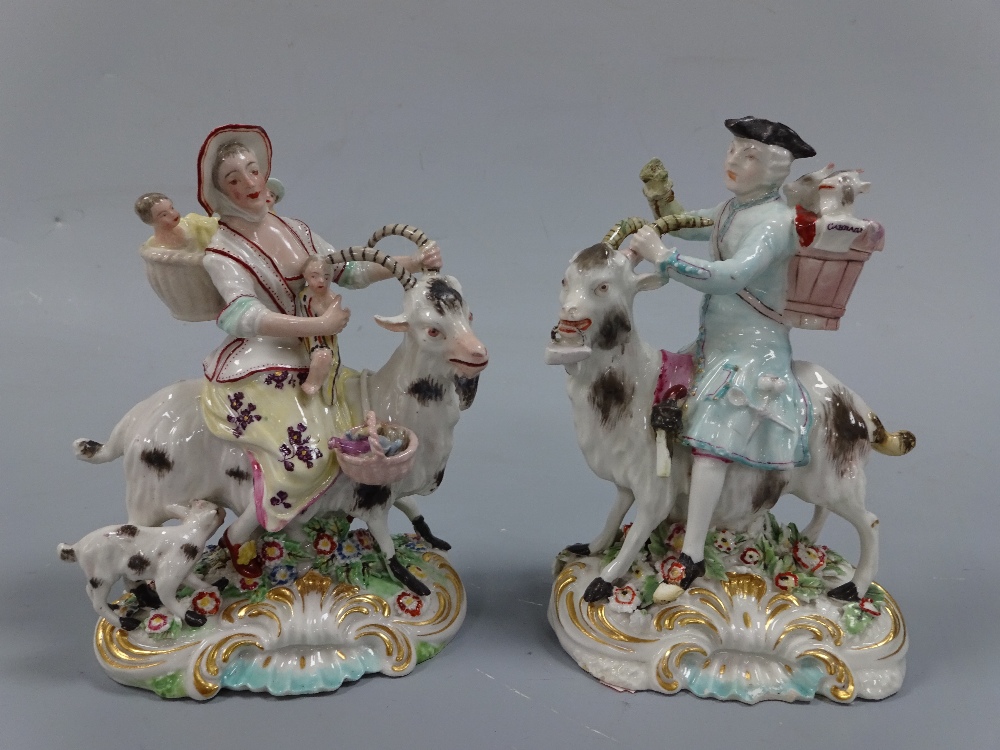 A PAIR OF DERBY FIGURE GROUPS, c.1770, The Welch Tailor and his wife, modelled as gent sat astride