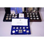 A ROYAL MINT BOXED SILVER MILLENIUM COLLECTION, five pound to five pence and maundy one penny to