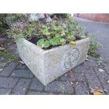 A SQUARE COMPOSITE GARDEN PLANTER