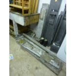 A DISMANTLED MARBLE FIRE SURROUND (sd)