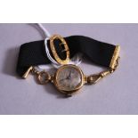 AN EARLY 20TH CENTURY LADIES WRISTWATCH, round shape case measuring approximately 23.5mm in