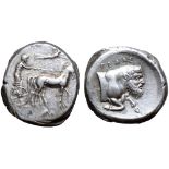 Sicily, Gela AR Tetradrachm. Circa 420-415 BC. Charioteer, holding kentron in left hand and reins in