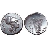 Lucania, Metapontion AR Half-Shekel. Hannibalic issue, circa 215-207 BC. Helmeted head of Athena