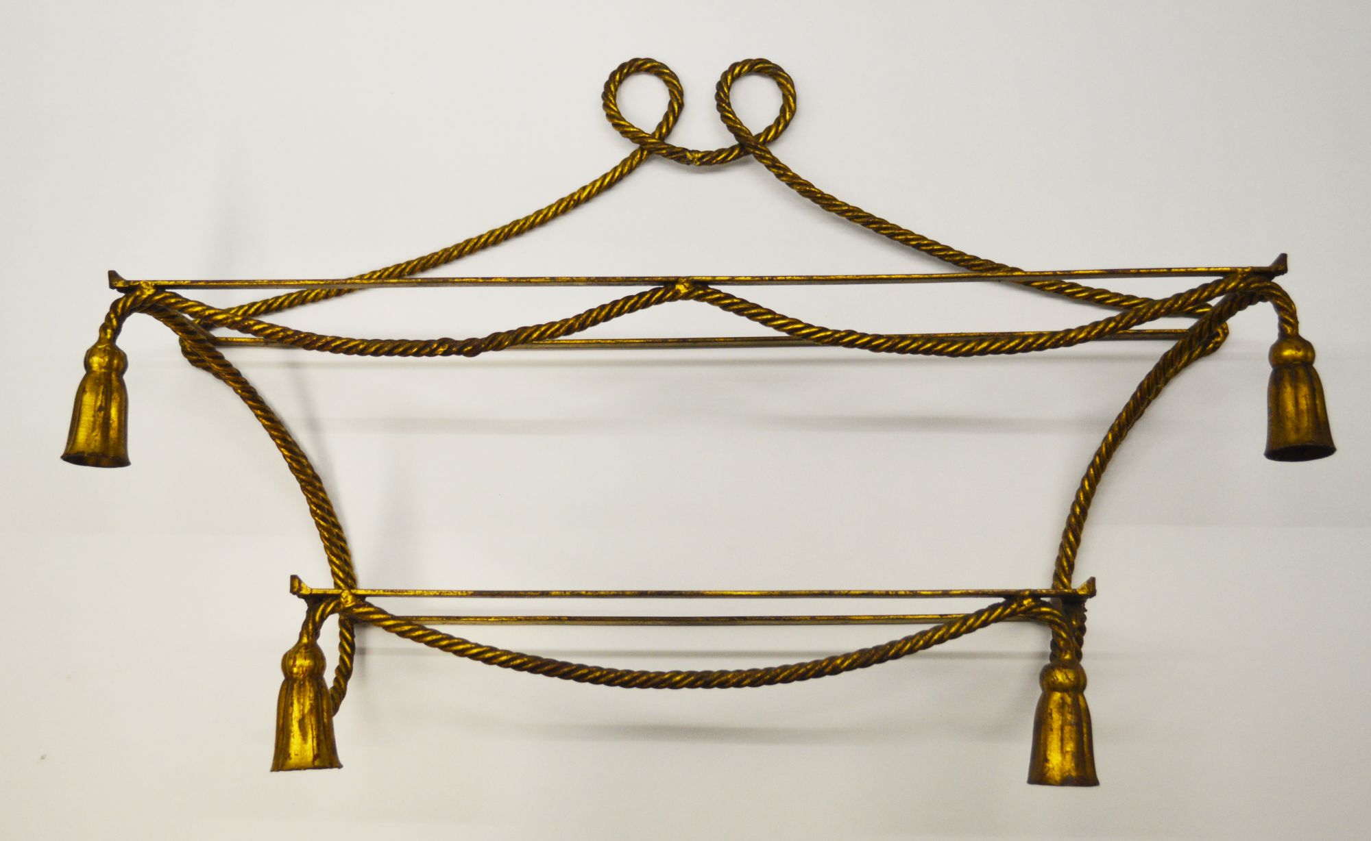 A French glass and gilt metal two tier wall shelf, 20th century, the frame of rope twist form,
