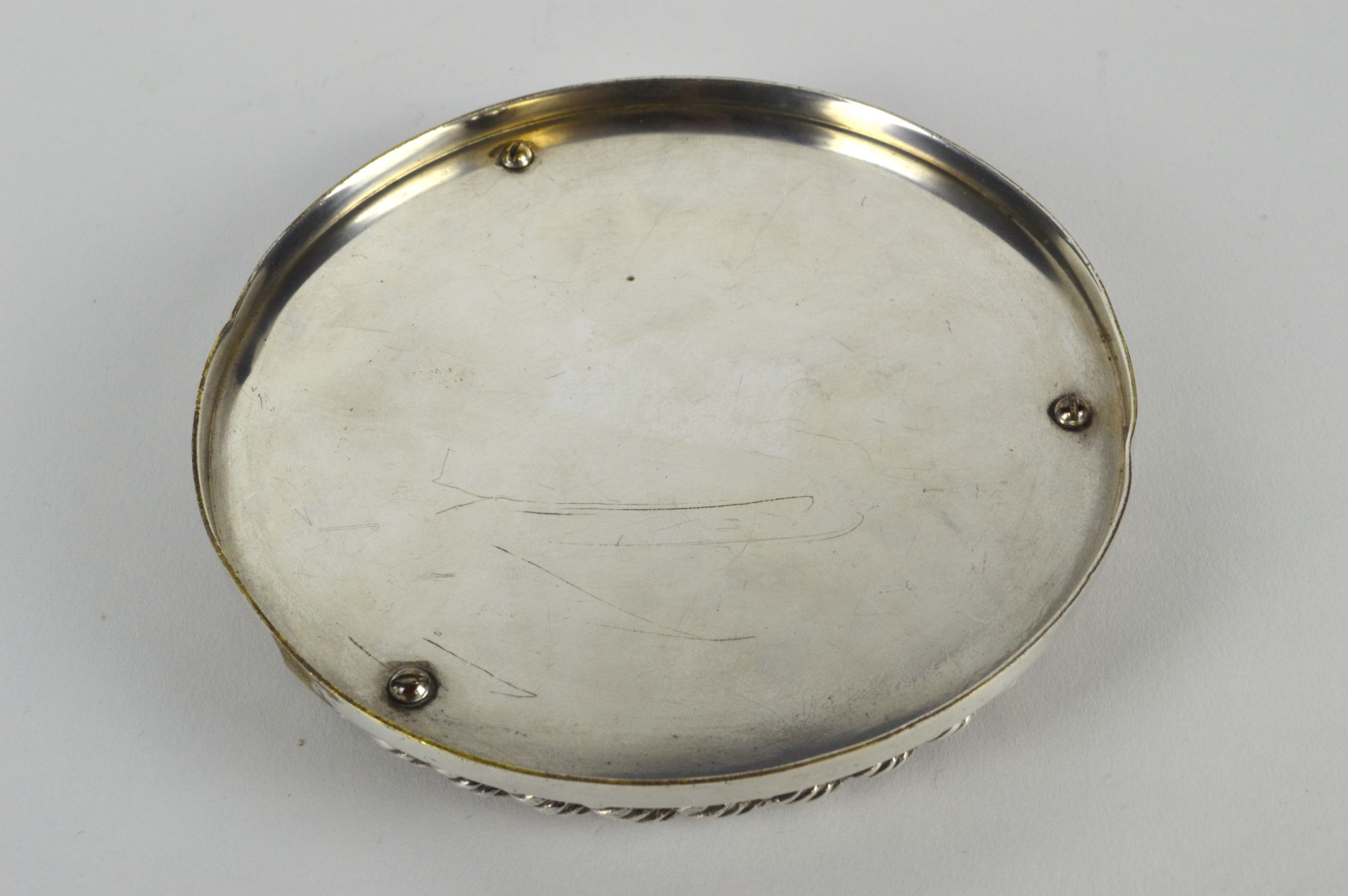 An Hermes silver plated bottle coater, of circular form, with bold rope border, - Image 2 of 2