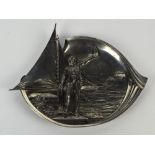 WMF pewter dish decorated with a sailor and a yacht, numbered 332 to back,