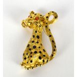 An 18ct gold and enamel brooch in the form of a leopard