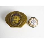 An 18th century Bilston enamel patch box inscribed to lid 'Pledge of Love' within a floral border,
