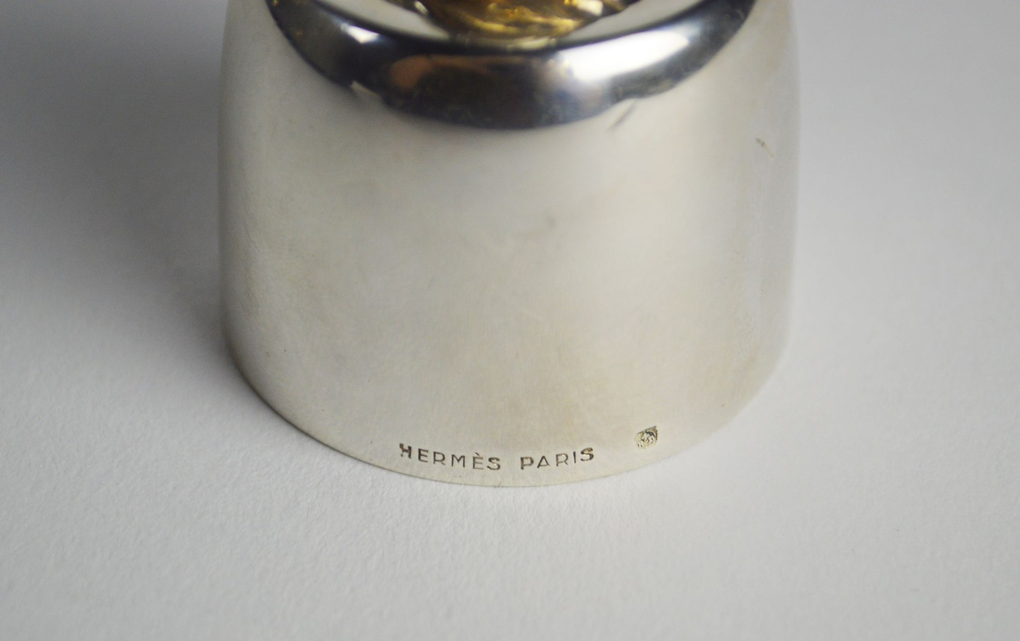 A Hermes silver plated wine bottle top surmounted with a horses' head, stamped 'Hermes Paris', - Image 2 of 3