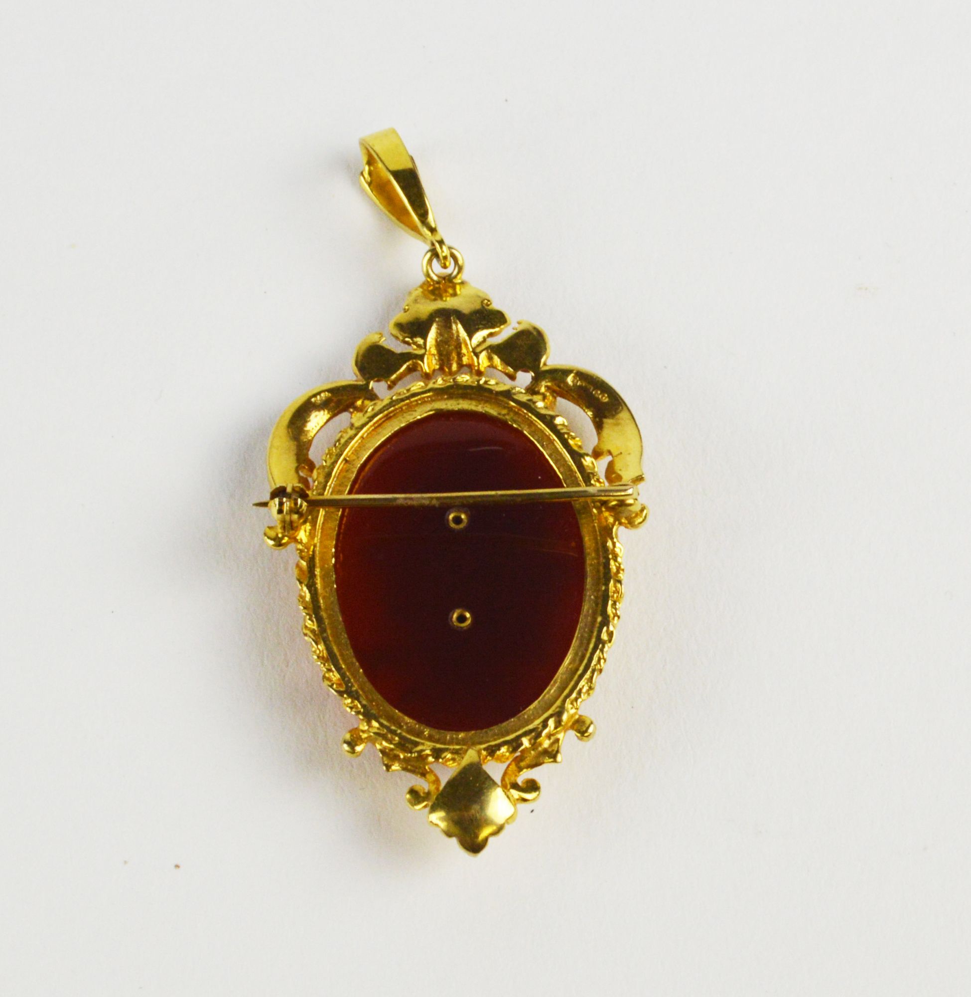 A 9ct gold, carnelian and diamond set brooch in the Rococo revival brooch / pendant, - Image 2 of 2