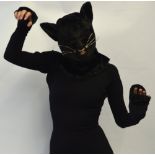 A theatrical costume for a black cat, 20th century, probably 1960's, to feature mask with eye brows,