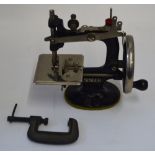 A vintage Singer sewing machine, 'A Singer For The Girls', with 'G' clamp, boxed,