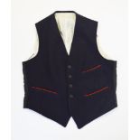 A George VI military waistcoat, of navy blue wool,