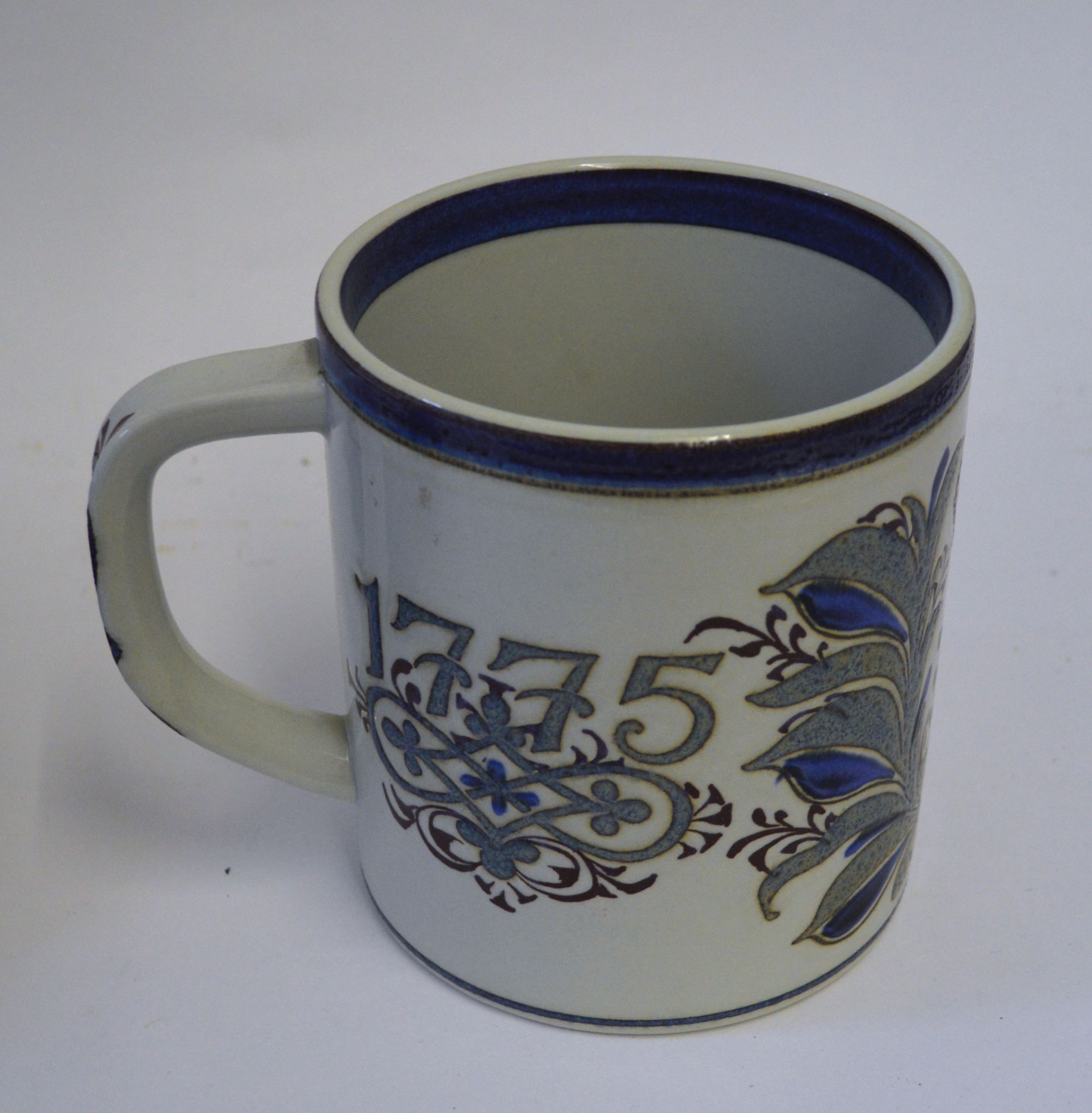 A Royal Copenhagen fajance over-sized mug by Nils Thorssen to commemorate the 200 year anniversary