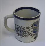 A Royal Copenhagen fajance over-sized mug by Nils Thorssen to commemorate the 200 year anniversary
