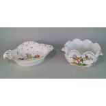 A Continental porcelain oval vegetable dish, with scrolling handles and an acanthus leaf rim,