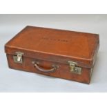 The Hon Thomas John Wynn, 5th Baron Newborough: a late 19th century leather suitcase, by Drew &