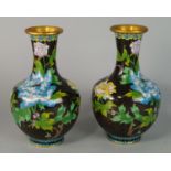 A pair of Chinese enamel bottle vases, 20th century, decorated with yellow and blue chrysanthemums