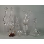 A pair of decorative glass decanters, 20th century, moulded to imitate hob nail cut glass,