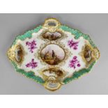 A Meissen lozenge shaped tray, 19th century, moulded with two pierced handles and a woven ground,