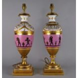 A pair of Empire style urn form lamps, 20th century,