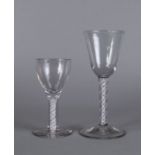 A English wine glass, 18th century, with white ribbon twist stem, on spreading foot, 17.