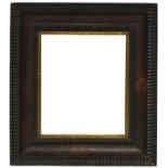 A Dutch Parcel Gilded and Ebonised Nutwood Ripple Moulding Frame, 17th century, with ogee sight,