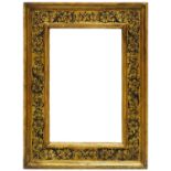 An Italian Parcel Gilded and Ebonised Cassetta Frame, 18th century, with cavetto sight, torus,