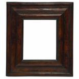 A Dutch Nutwood and Parcel Ebonised Bolection Frame, 17th century, with cavetto sight, ogee,