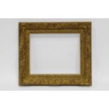 A Gilt Composition Louis XIV Style Glazed Frame, 20th century, with white painted slip, leaf sight,