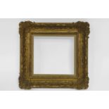 A Gilt Composition Louis XIII/XIV Transitional Style Frame, 20th century, with linen mounted slip,