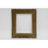 A Carved Louis XV Style Swept Frame with Decape Finish, mid 20th century, with painted slip,