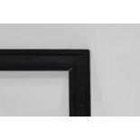 An Italian Black Painted Cassetta Frame, 18th century, with plain frieze, torus,